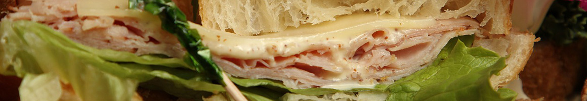 Eating Deli Sandwich at Nicks Deli & Marketplace restaurant in Hixson, TN.
